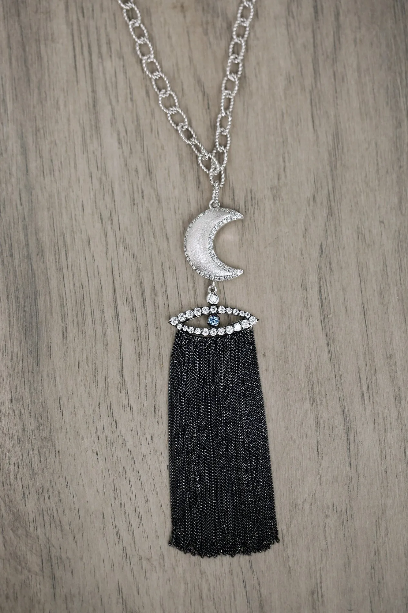 AMMANII Guardian Moon and Protective Eye Necklace with Tassels in Black Rhodium