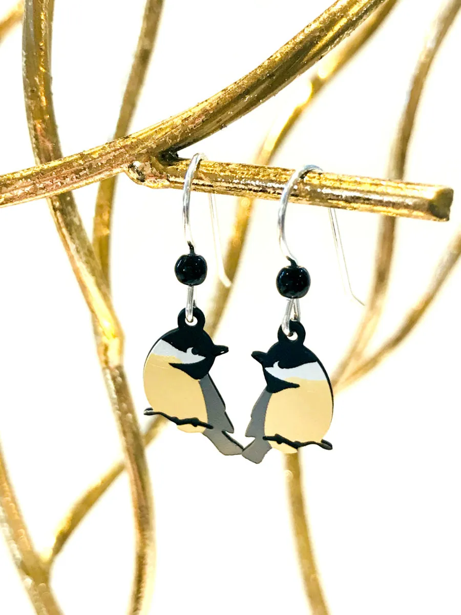 Chickadee on Branch Dangles by Sienna Sky